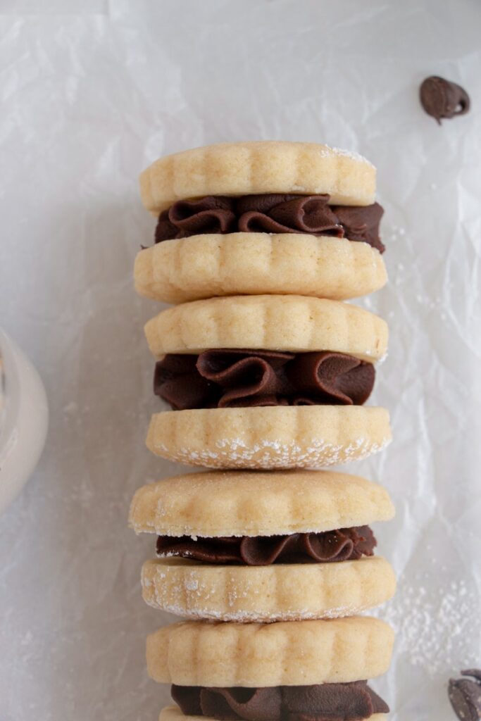 sandwich cookies stacked in a row