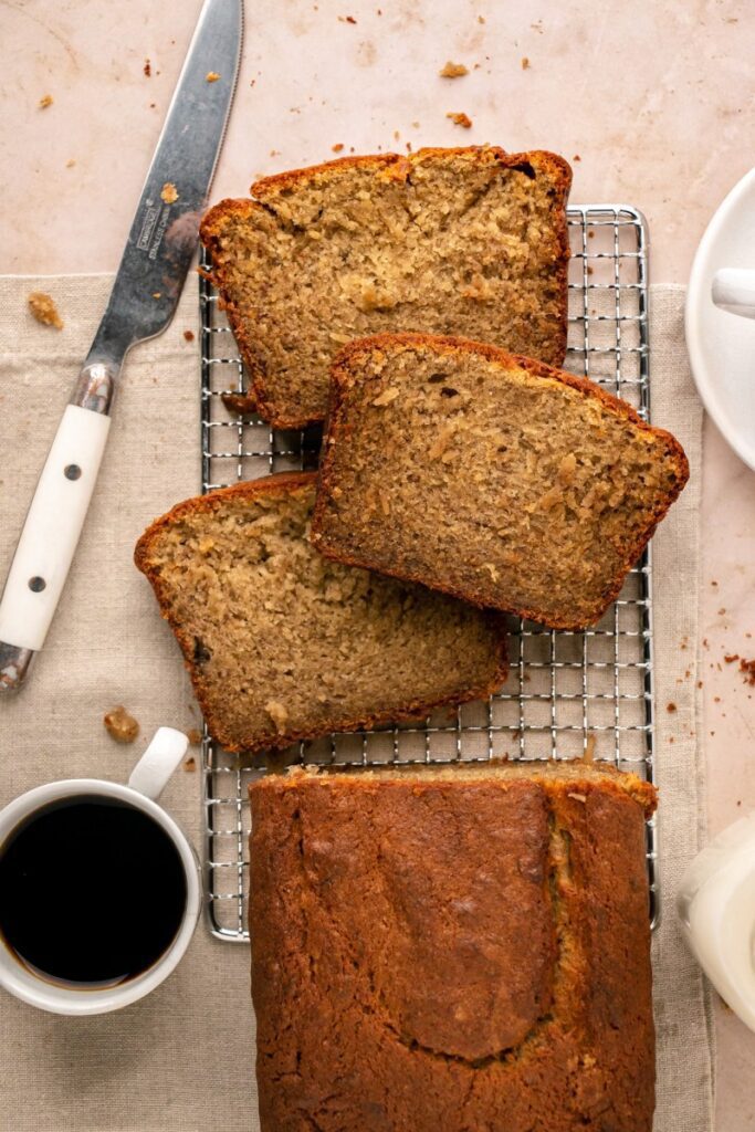 sliced banana bread and cup of espresso