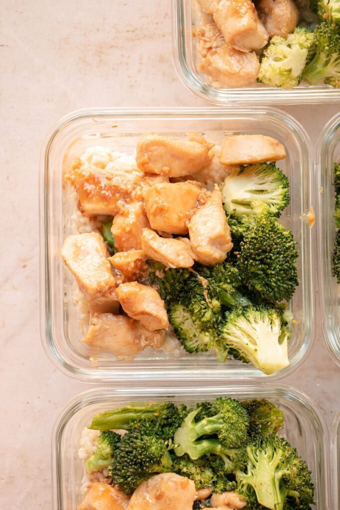 meal prep garlic ginger chicken bowls in meal prep containers 