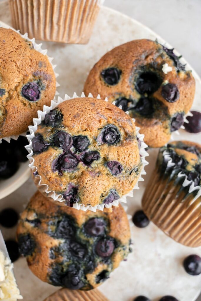 up close of bakery style blueberry muffins 