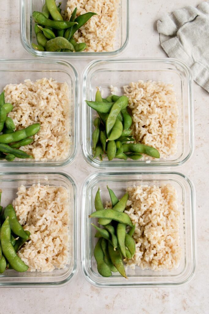 brown rice and edamame in meal prep bowls
