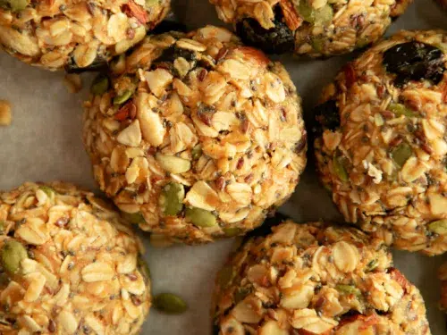 scoops of breakfast cookies with seeds and dried fruits