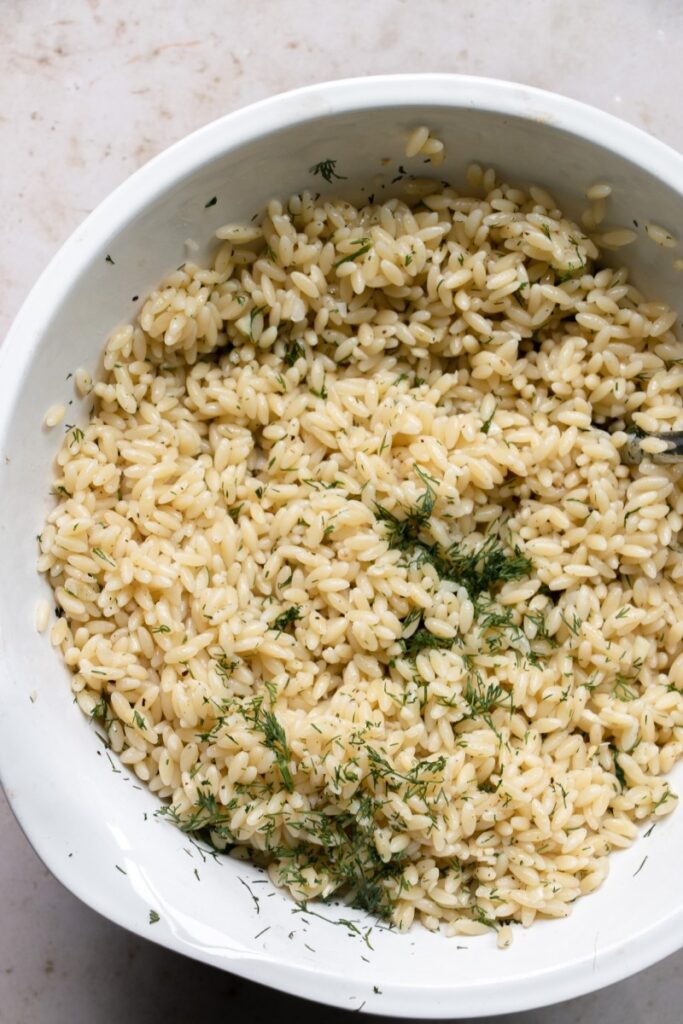 bowl full of herbed orzo with fresh dill