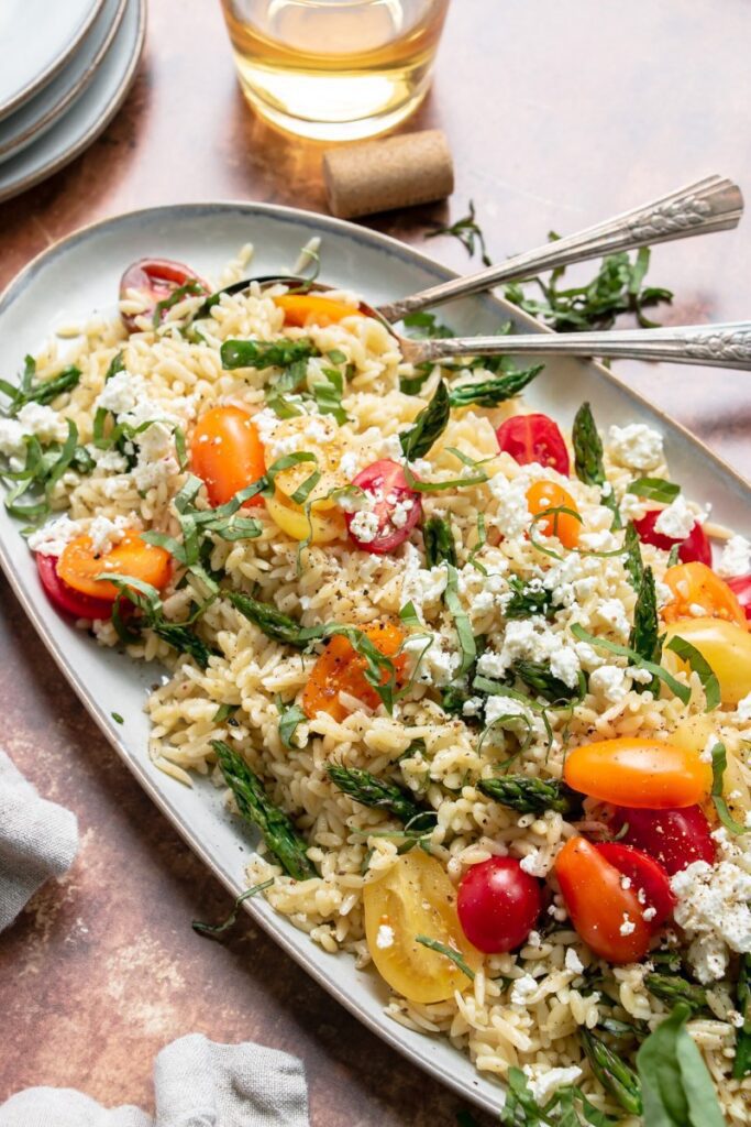 Roasted Asparagus and Feta Orzo Salad on a platter