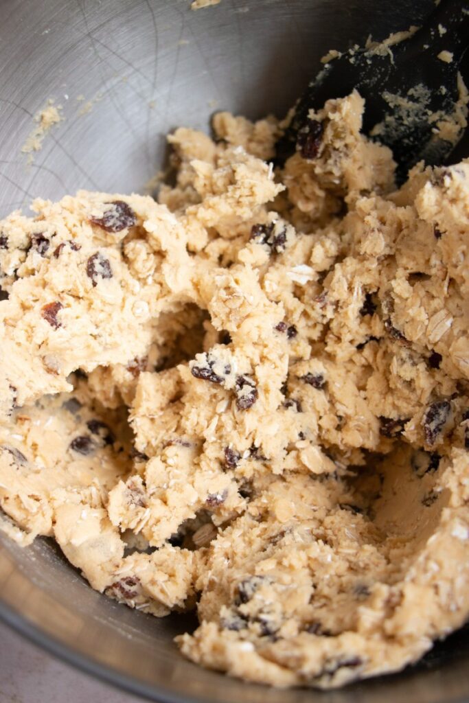 Easy Soft & Chewy Oatmeal Raisin Cookie dough in a mixing bowl