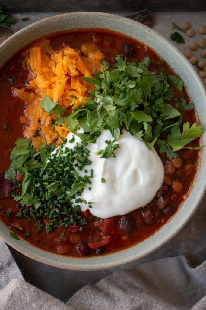 bowl of chili with toppings 