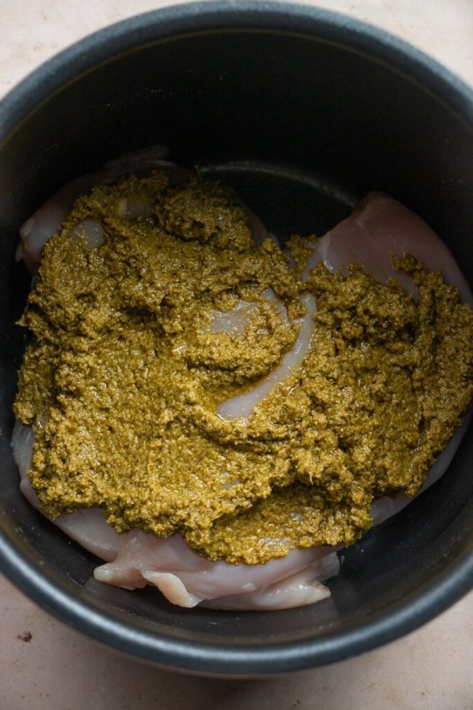 raw chicken and pesto in the instant pot