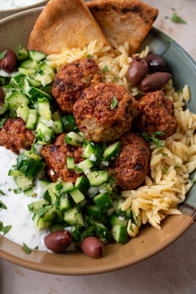 turkey meatballs over a bed of orzo