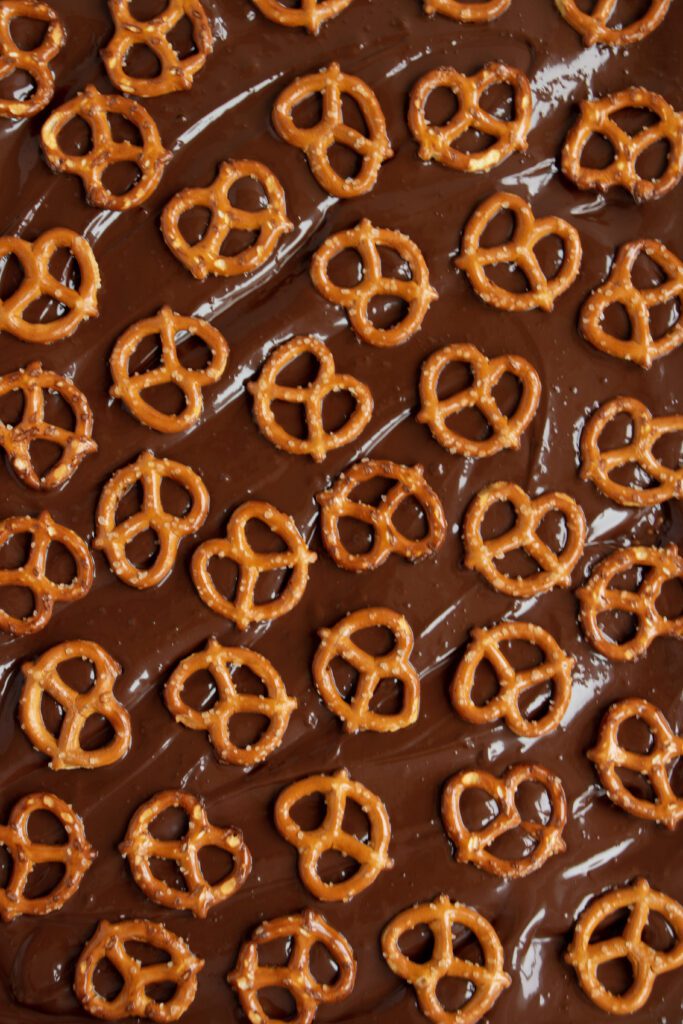 melted dark chocolate with pretzels 