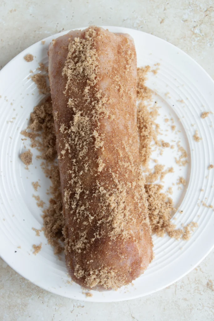 raw pork tenderloin rubbed in brown sugar mix 