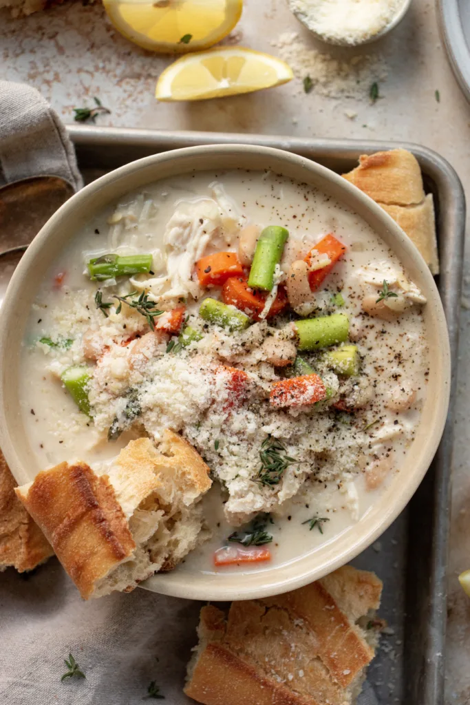 slow cooker lemon chicken orzo soup with a baguette 