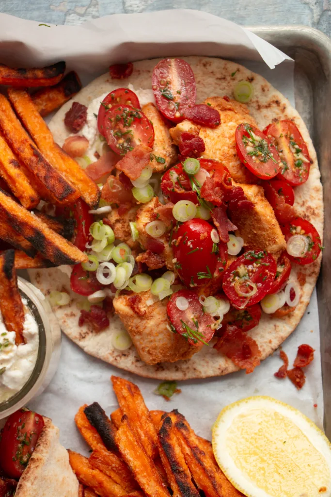 open faced chicken pita with marinated tomatoes 