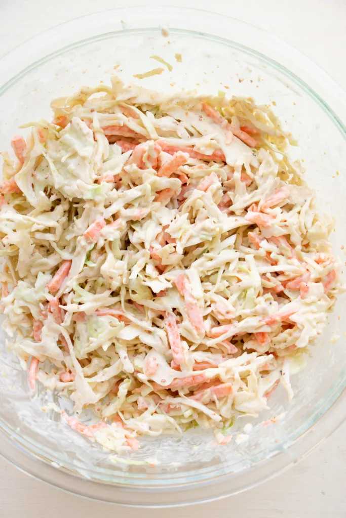 combined slaw in a mixing bowl