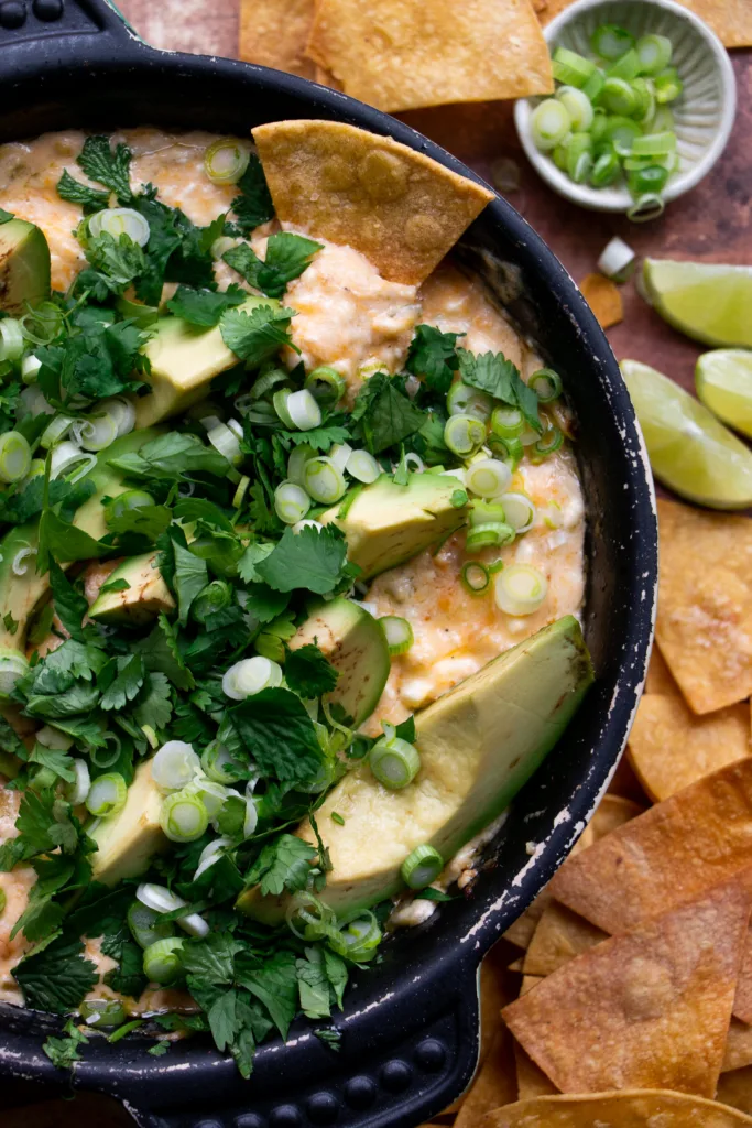 creamy hatch green chile dip in a baking dish