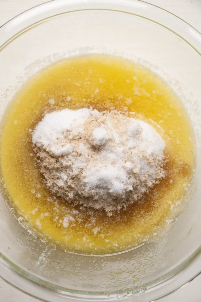 melted butter and sugars in a bowl