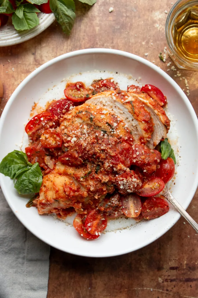 seared chicken breast topped with creamy tomato basil sauce 