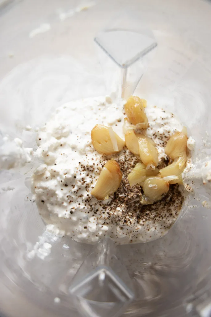 roasted garlic and cottage cheese in a blender