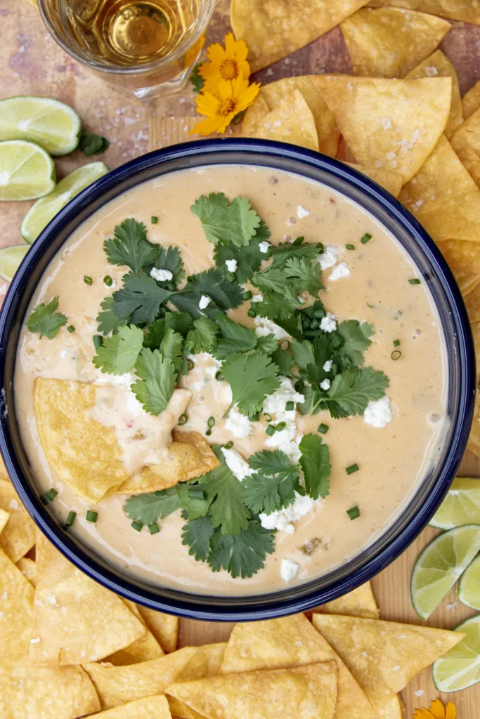 white queso topped with cilantro 