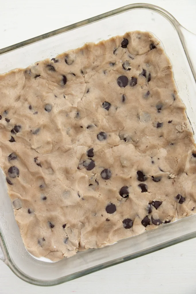 chocolate chip cookie dough in a baking dish