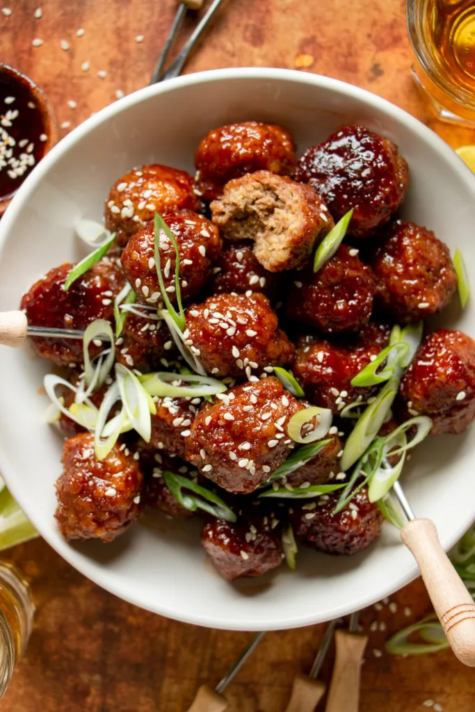 instant pot cocktail meatballs with green onion and sesame seeds 