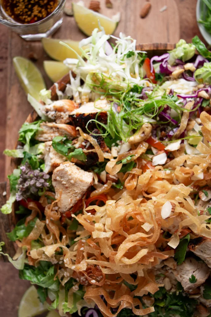 large bowl full of spicy Thai chicken salad 