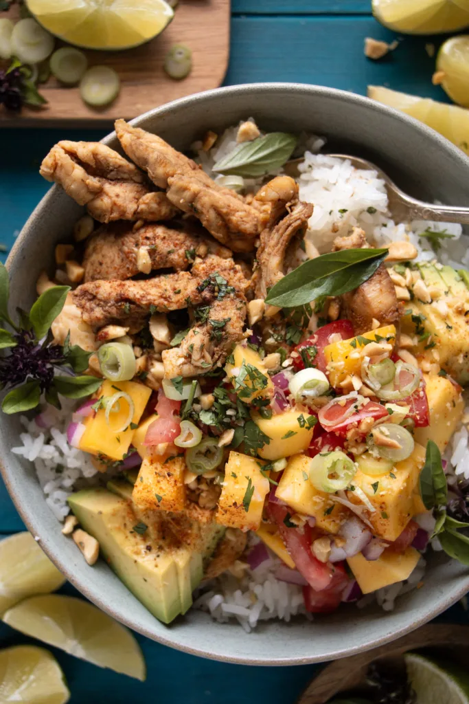 rice bowl with chicken and mango salsa