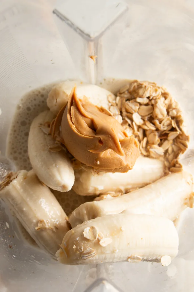 banana, oats, peanut butter, milk, and vanilla in a blender