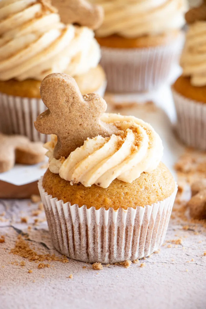 coffee cupcake topped with mini gingerbread men 