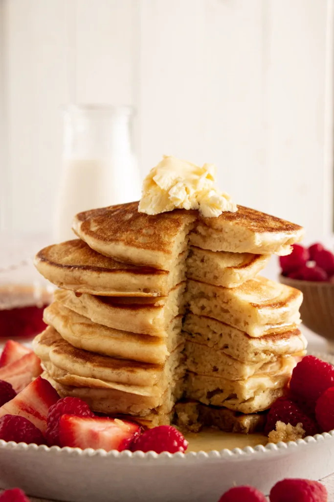stack of pancakes with a bite taken out