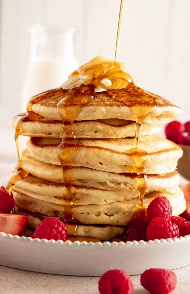 stack of copycat Denny's pancakes with maple syrup