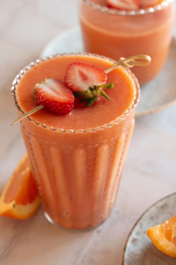 smoothie with a strawberry garnish 