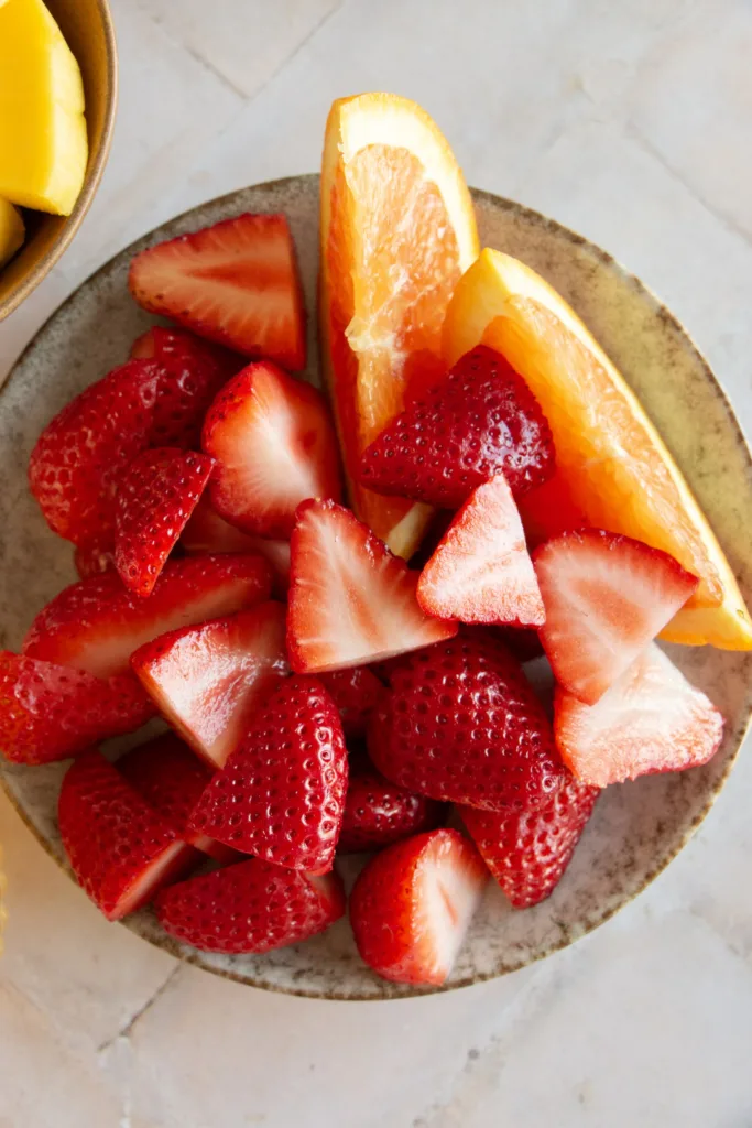 fresh strawberries and orange slices