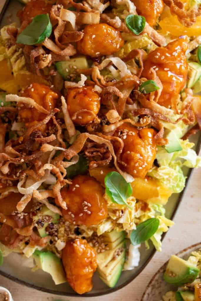 large platter with orange chicken salad