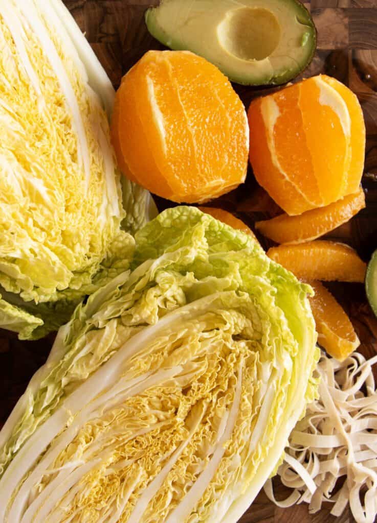 Napa cabbage and peeled oranges