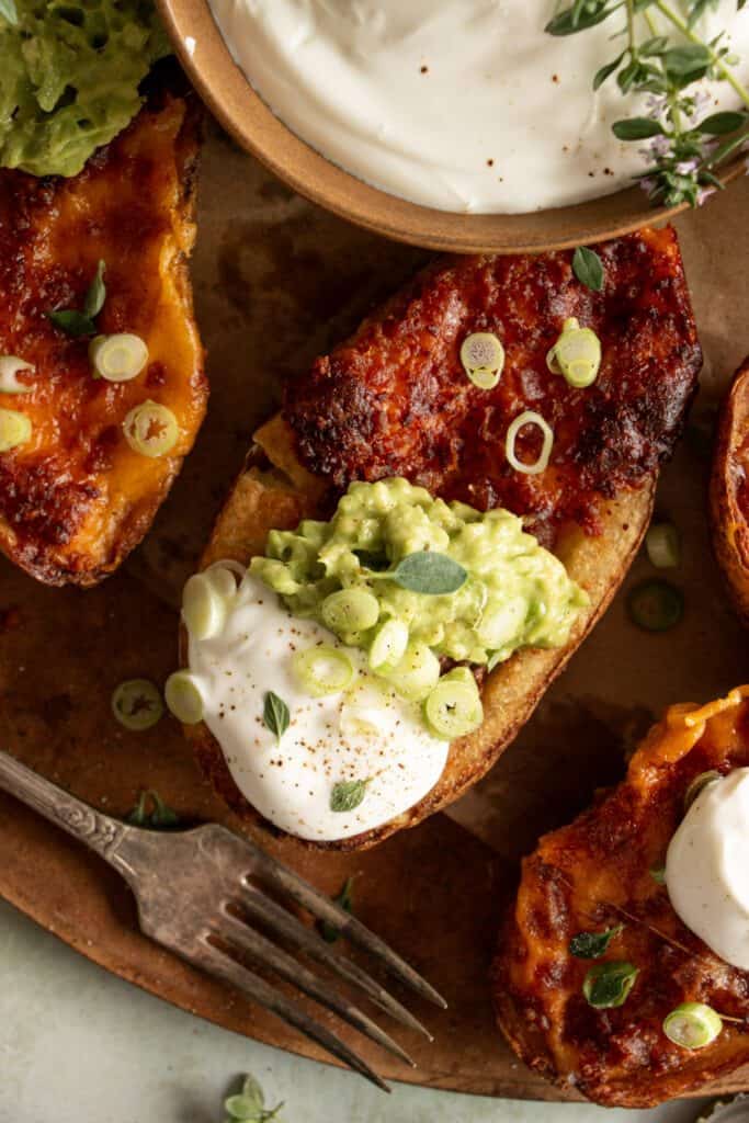 crispy air fried potato skins with guacamole and sour cream