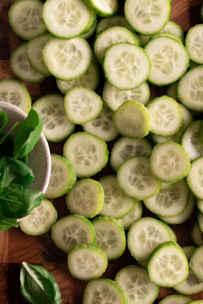 sliced cucumber on a cutting board