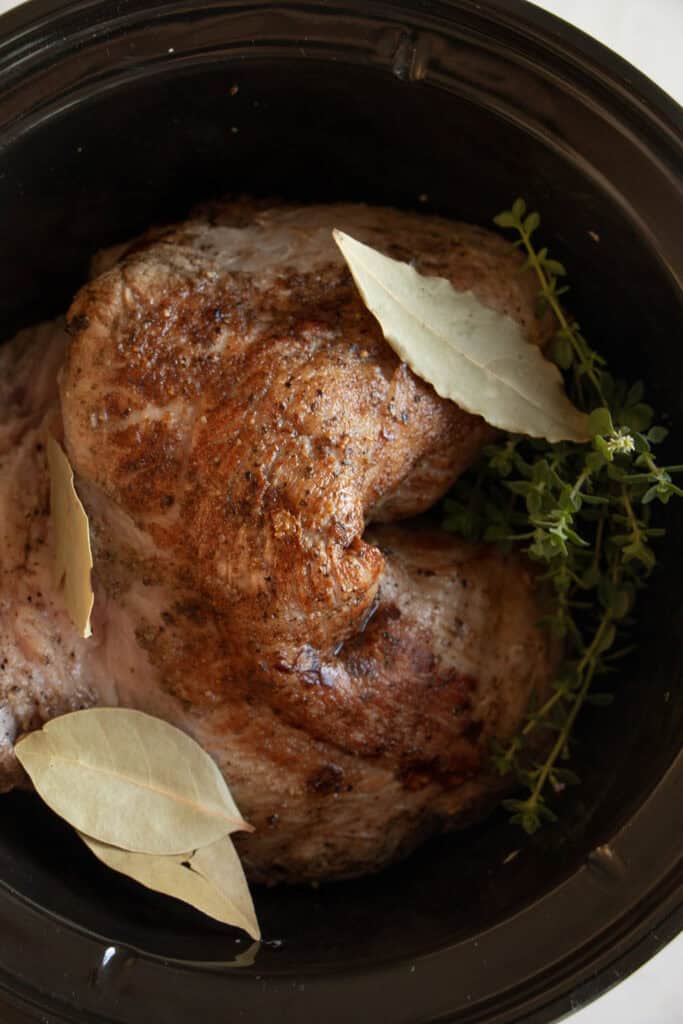 seared pork with herbs and bay leaves