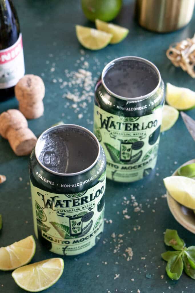 cans of sparkling water with the tops removed 