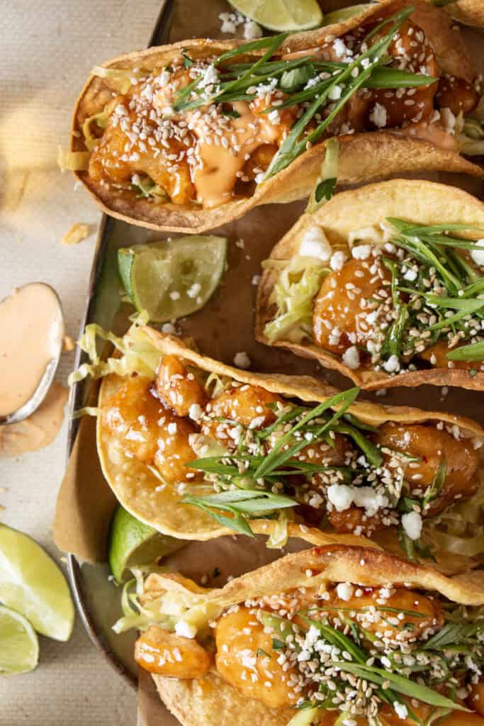 breaded chicken tacos on a platter