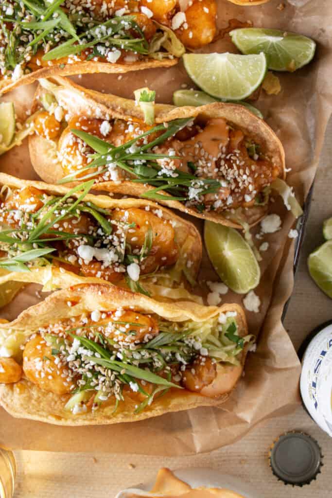 loaded sesame chicken tacos with slaw 