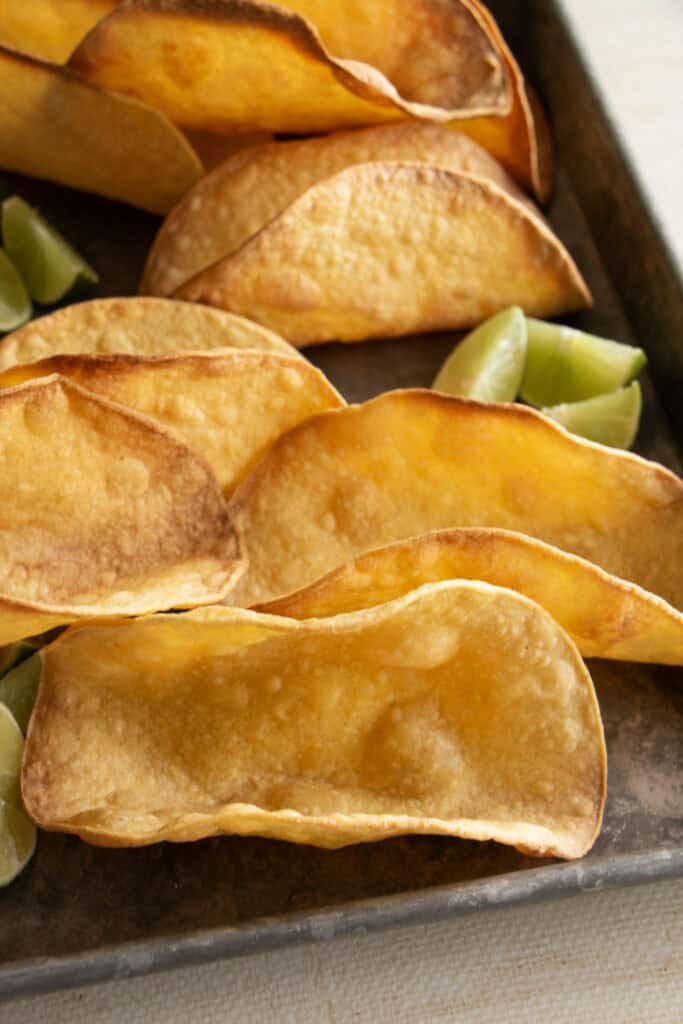 crispy corn tortillas on a tray 