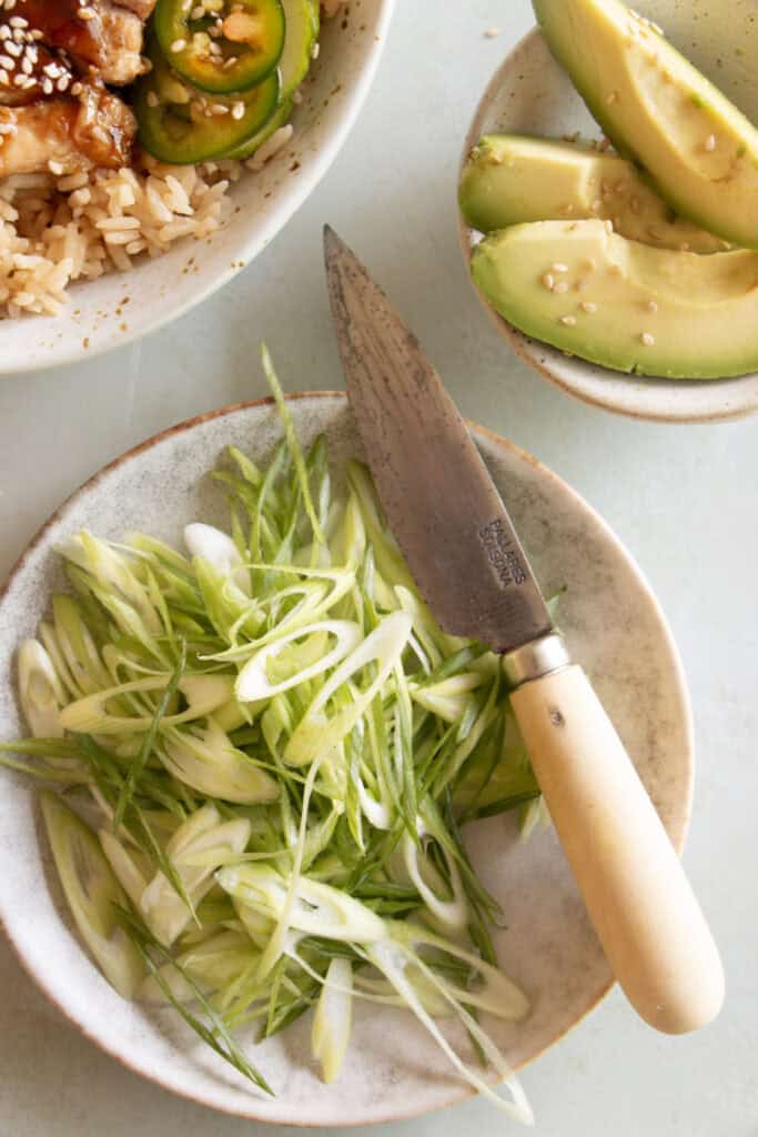 sliced green onions on a plate