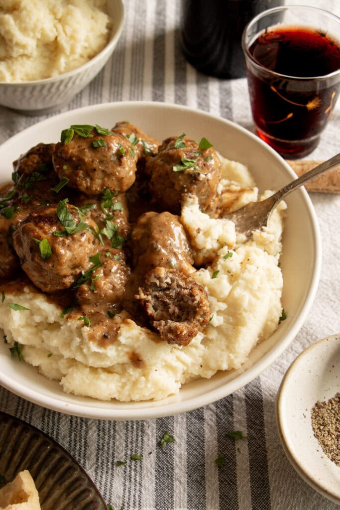 bowl full of beef and pork meatballs 