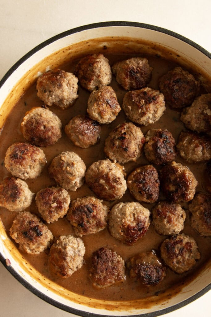 meatballs snuggled in the pan gravy