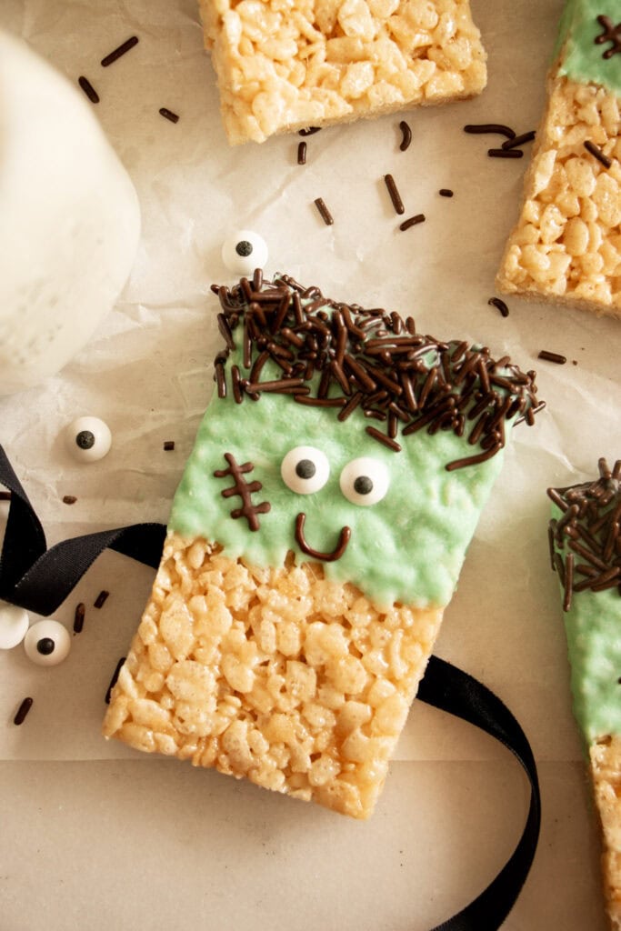 rice Krispie treats on a sheet of parchment paper 