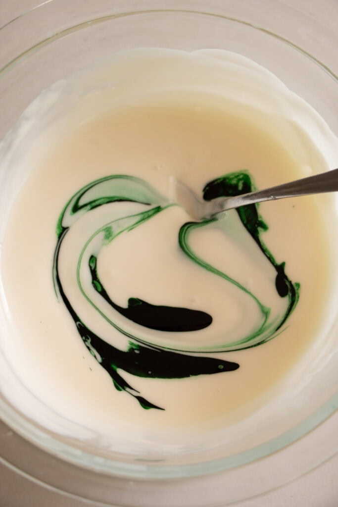 melted white chocolate with green food coloring 