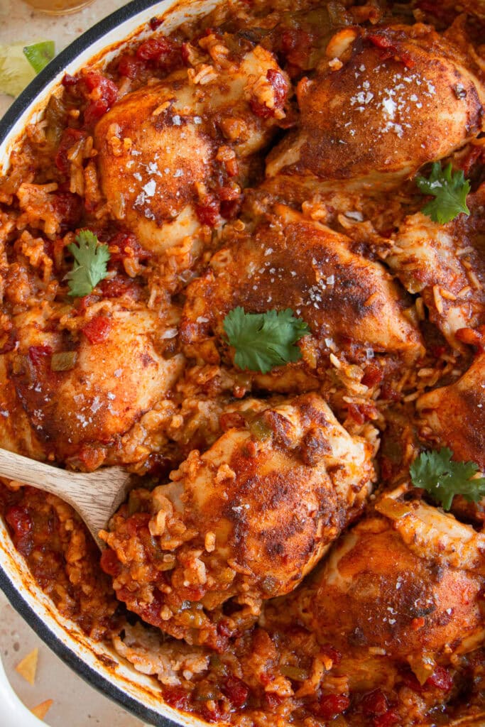 Overhead shot of a chicken thigh in Mexican rice 