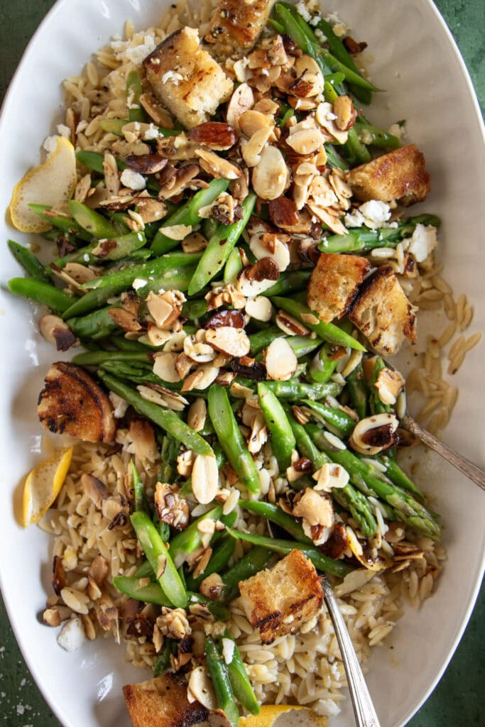 bowl of cold asparagus orzo salad 