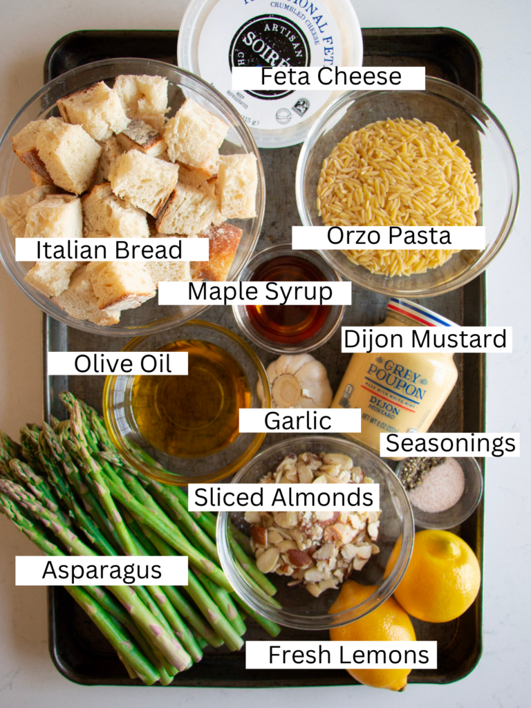 Asparagus salad ingredients on a sheet pan 
