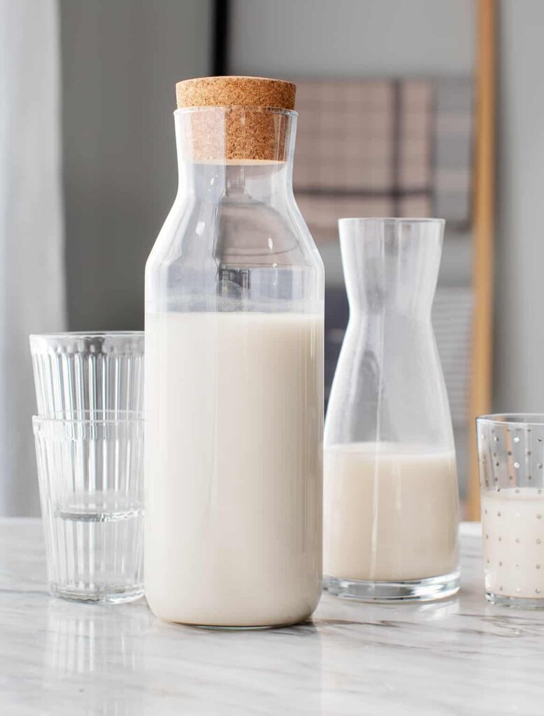 homemade oat milk in a carafe 